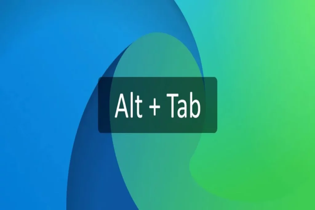 Comando de teclado Alt + Tab exibido em destaque sobre fundo colorido azul e verde no Windows